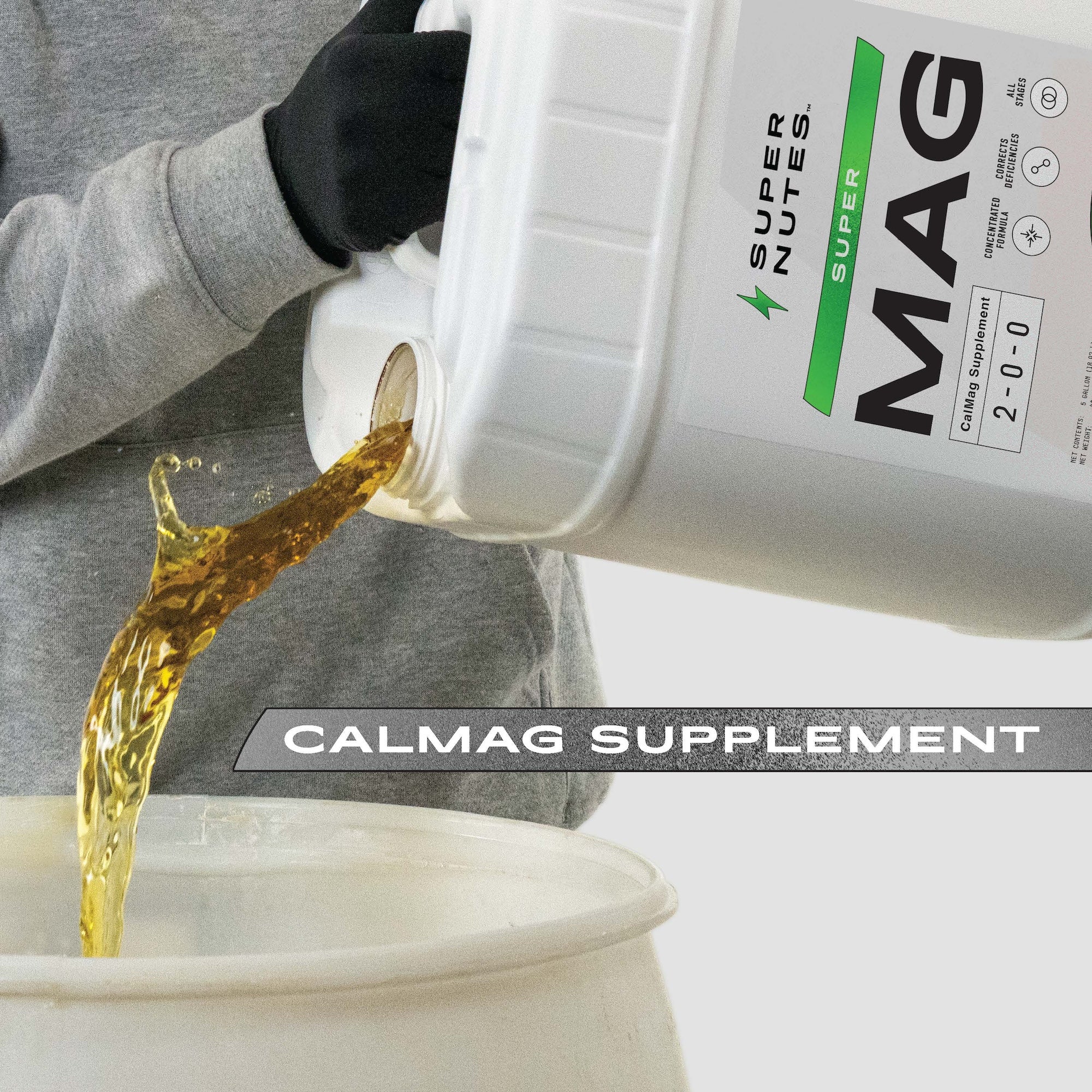 Person pouring Super Mag Cal-Mag supplement into a container with visible brand label.